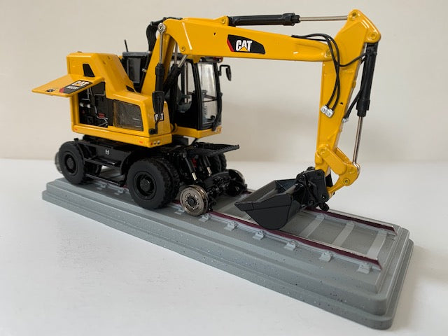 CAT M323F RAILROAD EXCAVATOR-SAFETY YELLOW. Scale 1:50